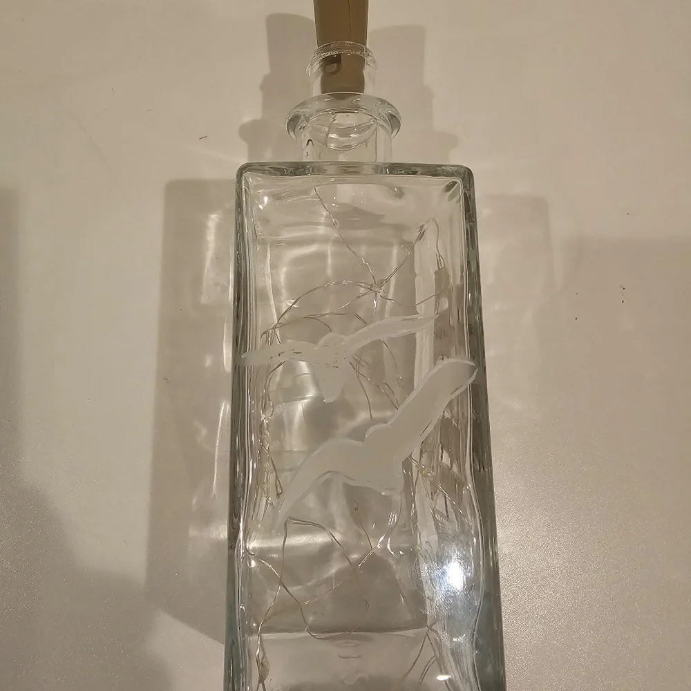 Liquor bottle with cork lights